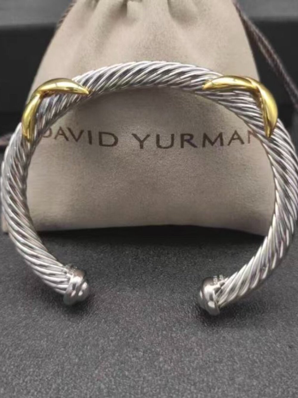 David Yurman's bracelet with a cross motif